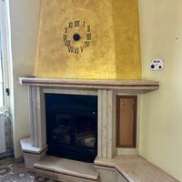 TERMOCAMINO + RIVESTIMENTO IN MARMO