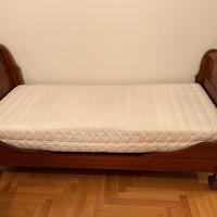 Letto a barchetta in noce