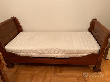 Letto a barchetta in noce