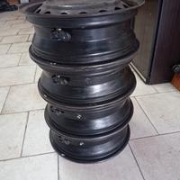 4 cerchioni e 4 borchie 