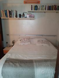 letto con parete attrezzata