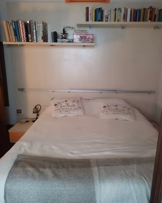 letto con parete attrezzata