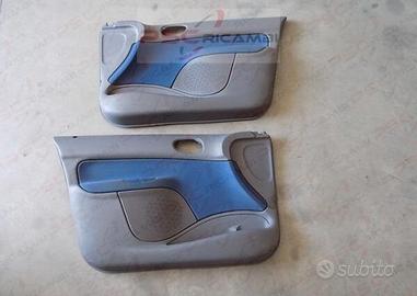 Pannelli porta portiera sportello Peugeot 206
