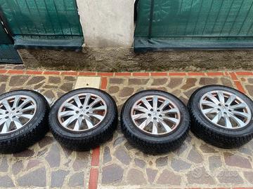 Set 4 cerchi in lega gomme 4 stagioni 225/60 R18
