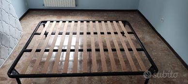 Rete a doghe in legno