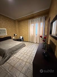 Camera da letto moderna stupenda