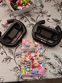 Mario kart 8 deluxe + volanti prenotato
