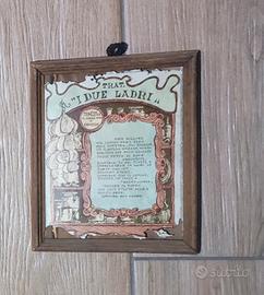 Quadri vintage con pittura su legno