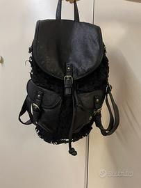 Zainetto in pelle nera con ricami a fiori Claire’s