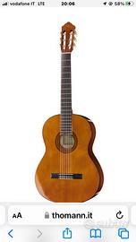 CE R CO Chitarra classica in PER MU TA con altro