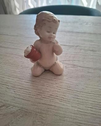 Statuetta Nao by Lladró – Putto con vaso di fiori