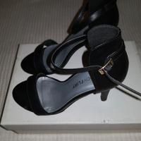 Sandali neri con tacco alto