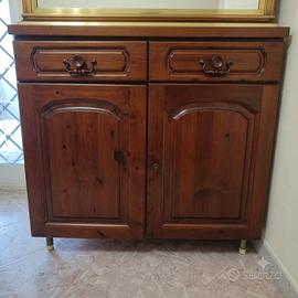 Credenza con tavolo a scomparsa integrato