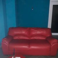 Coppia di divani rossi