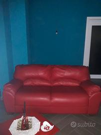Coppia di divani rossi