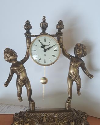 orologio a pendolo antico  ,revisionato 