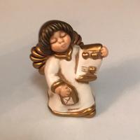 Angelo Thun con spartito musicale