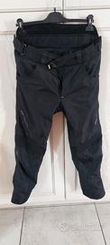 giacca, pantaloni e casco  per moto