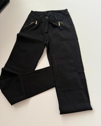 Pantaloni neri attillati finte tasche anteriori