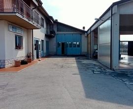 Abitazione con annessi capannoni