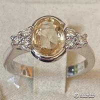 ANELLO ORO 18kt. CON DIAMANTI E ZAFFIRO GIALLO