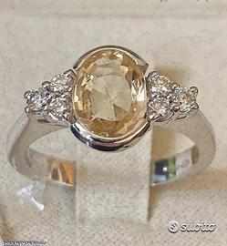 ANELLO ORO 18kt. CON DIAMANTI E ZAFFIRO GIALLO