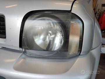 Proiettore sinistro SUZUKI JIMNY del 2002