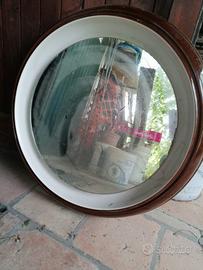 cornice in ceramica con specchio retroilluminata