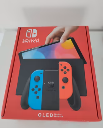 Nintendo Switch OLED completa di accessori