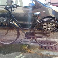 bici nera donna con portapacchi