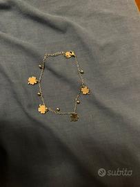 Bracciale in acciaio con quadrifogli