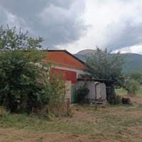 Rustico (capannone) con terreno