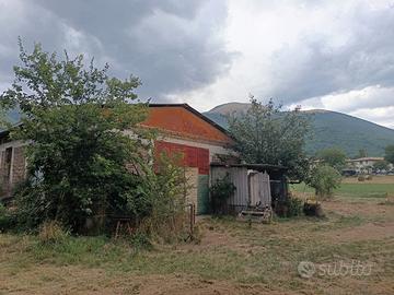 Rustico (capannone) con terreno