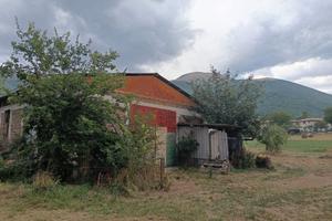 Rustico (capannone) con terreno