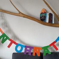 Festone con scritta "Bentornata/o/e/i"