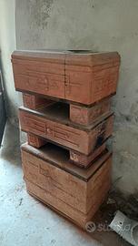 stufa antica a legna in terracotta 