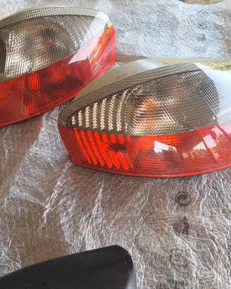 fari freccia bianca Porsche boxster