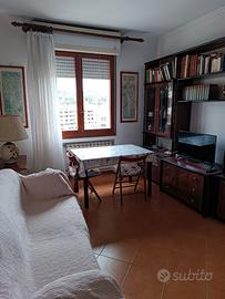 I camera doppia uso singola con salotto