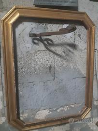 cornice legno dorata