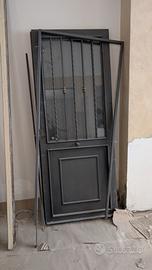 Portone in ferro battuto con lucernaio