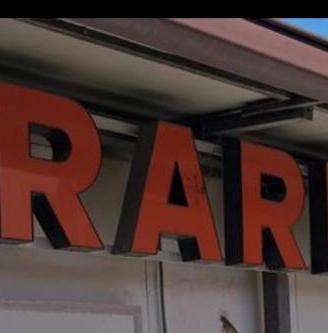 Insegna luminosa neon lettere Flos