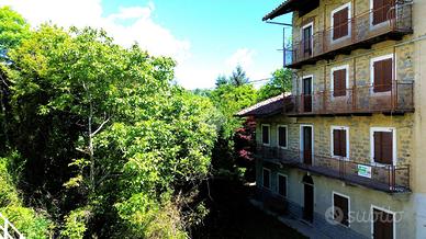 CASA SEMINDIPENDENTE A STRONA