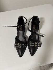 Scarpe con tacco largo