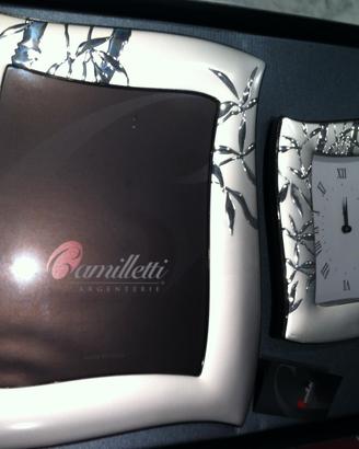 Cornice d'argento e cornice orologio