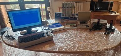 Commodore 64+accessori  ed enciclopedia dedicata