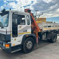 Volvo FL616 con gru e ribaltabile trilaterale