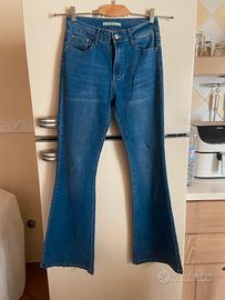 Jeans a zampa (flare) denim elasticizzato