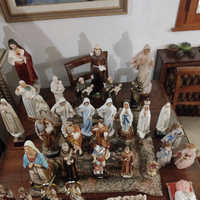 Statue santi crocifissi e arazzi stole sacerdotali