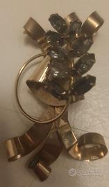 Spilla vintage in metallo dorato