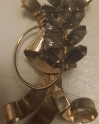 Spilla vintage in metallo dorato